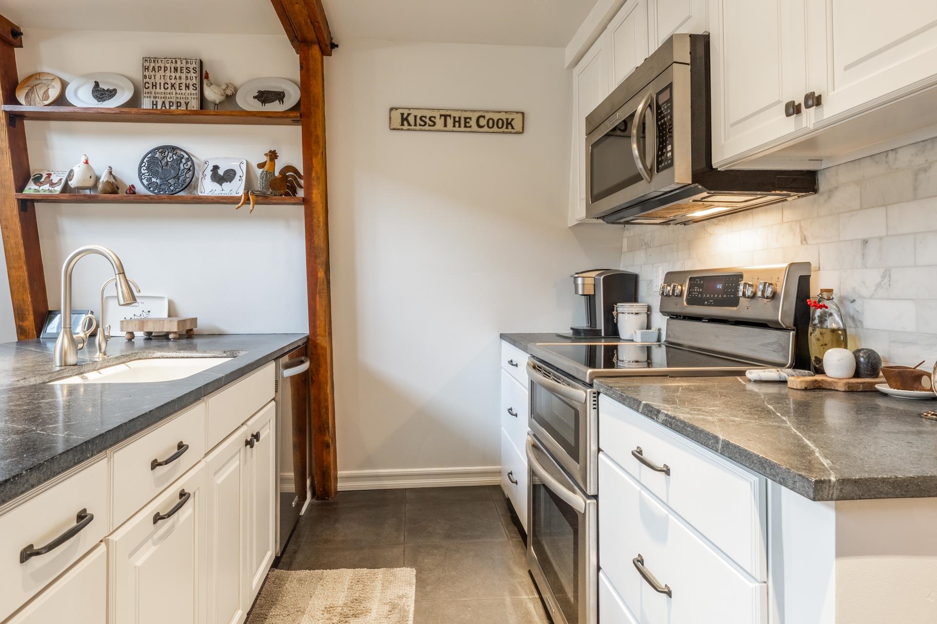 349 Davison Road Mammoth Lakes, CA 93546 - Photo 11 of 43 Kitchen featuring white cabinets, stainless steel appliances, open shelves, and decorative backsplash