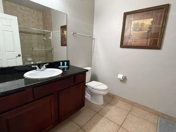 a bathroom with a sink and a toilet