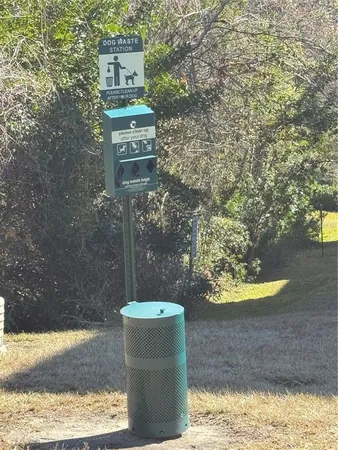 a view of a water fountain in the yard