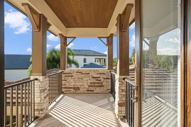 a view of a backyard with a small swimming pool
