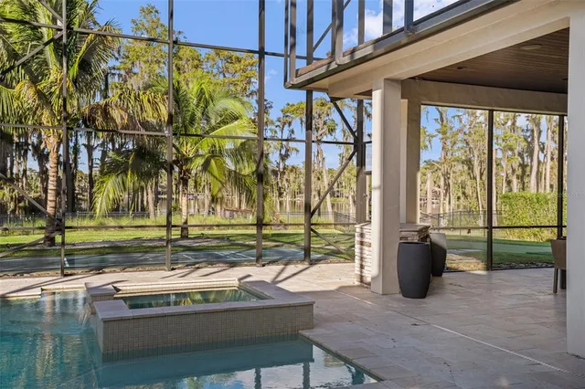 a view of a golf course with a trees
