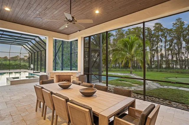 a view of a lake with a house in the background