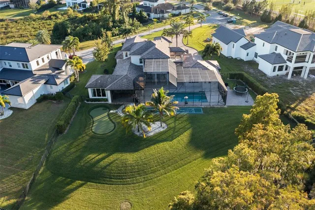 a aerial view of a house with a garden and plants