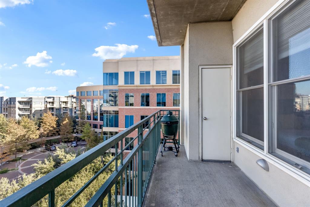 5055 Addison Circle, Unit 733 Addison, TX 75001 - Photo 20 of 40 a view of a balcony with an outdoor space