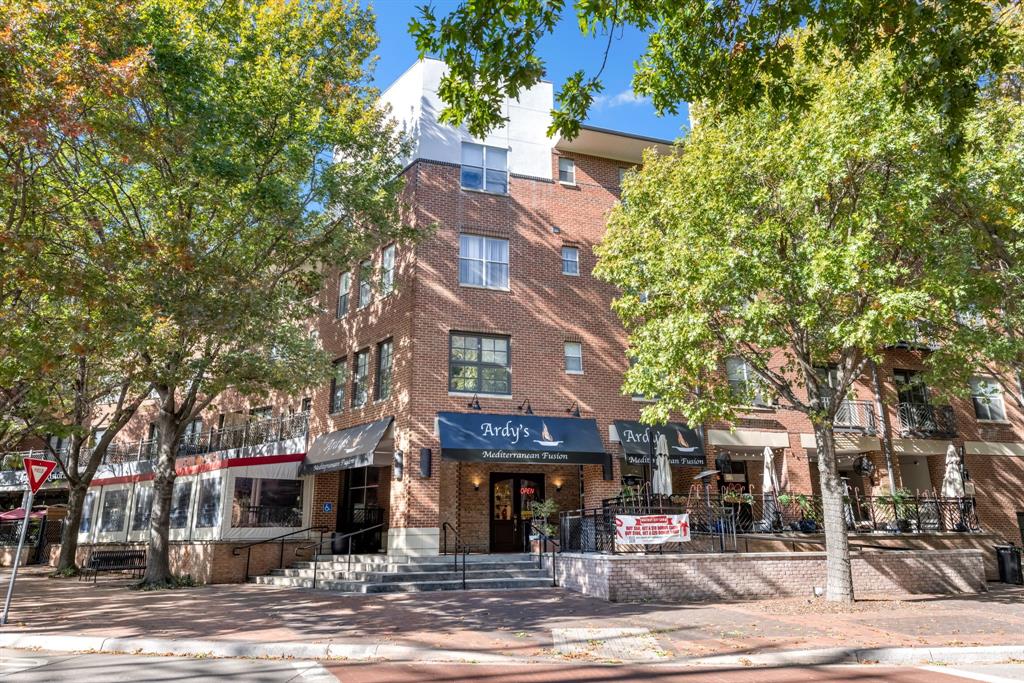 5055 Addison Circle, Unit 733 Addison, TX 75001 - Photo 31 of 40 a view of a building with a street