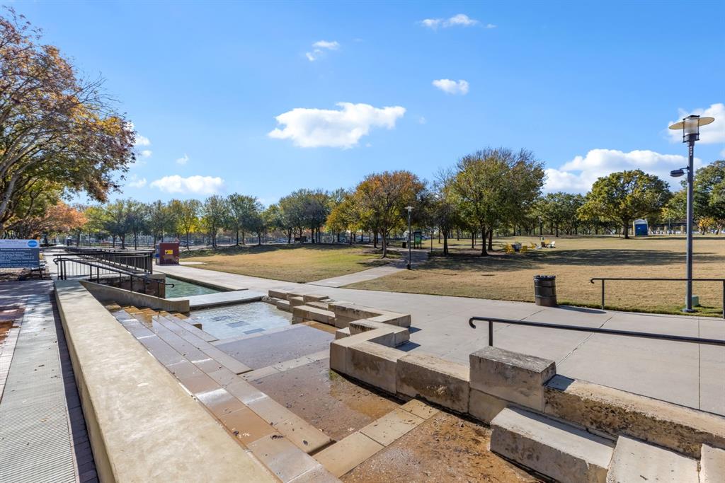 5055 Addison Circle, Unit 733 Addison, TX 75001 - Photo 36 of 40 a view of swimming pool with outdoor seating and plants
