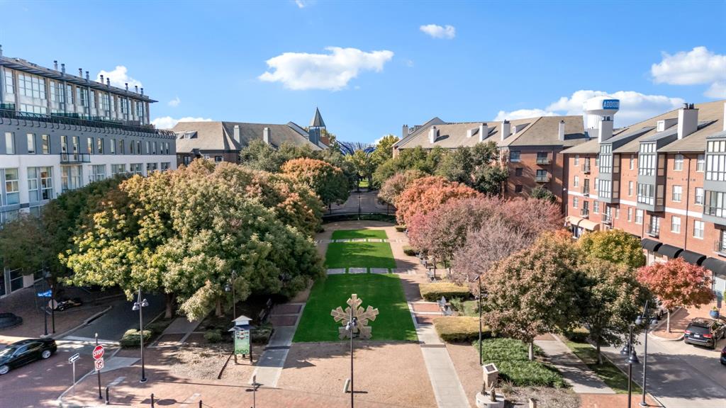 5055 Addison Circle, Unit 733 Addison, TX 75001 - Photo 39 of 40 a front view of a house with a yard