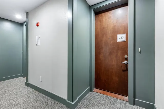 a hallway with a large window