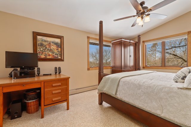 2202 Stieg Road Woodstock, IL 60098 - Photo 25 of 55 a bedroom with a bed and a desk