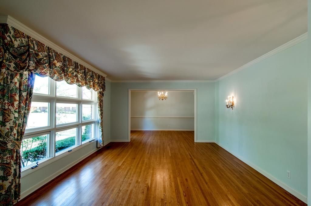 6329 Torrington Road Nashville, TN 37205 - Photo 3 of 18 wooden floor in an empty room with a window