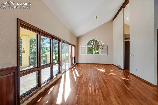 a view of an empty room and window