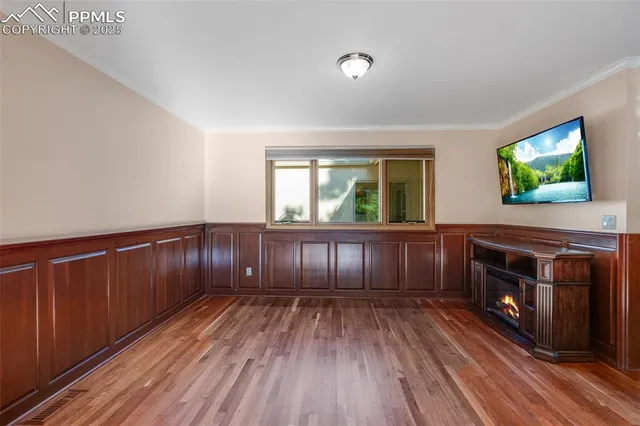a view of livingroom with furniture and a flat screen tv