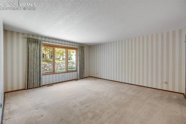 a view of an empty room with window