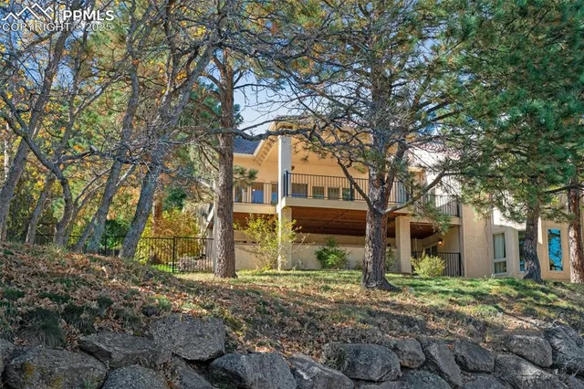 a backyard of a house with lots of green space