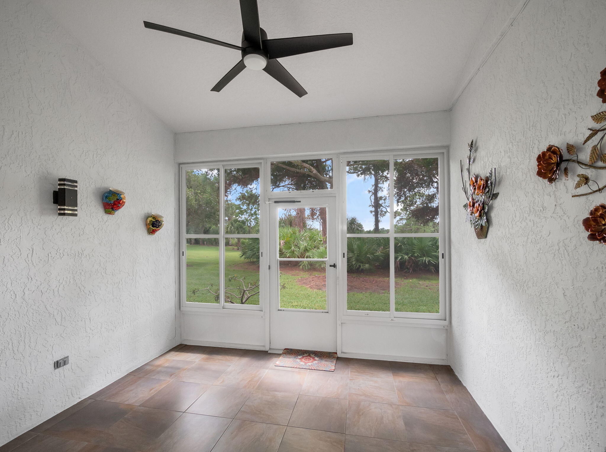 1583 Southwest Harbour Isles Circle, Unit 57 Port St. Lucie, FL 34986 - Photo 28 of 33 Covered Patio