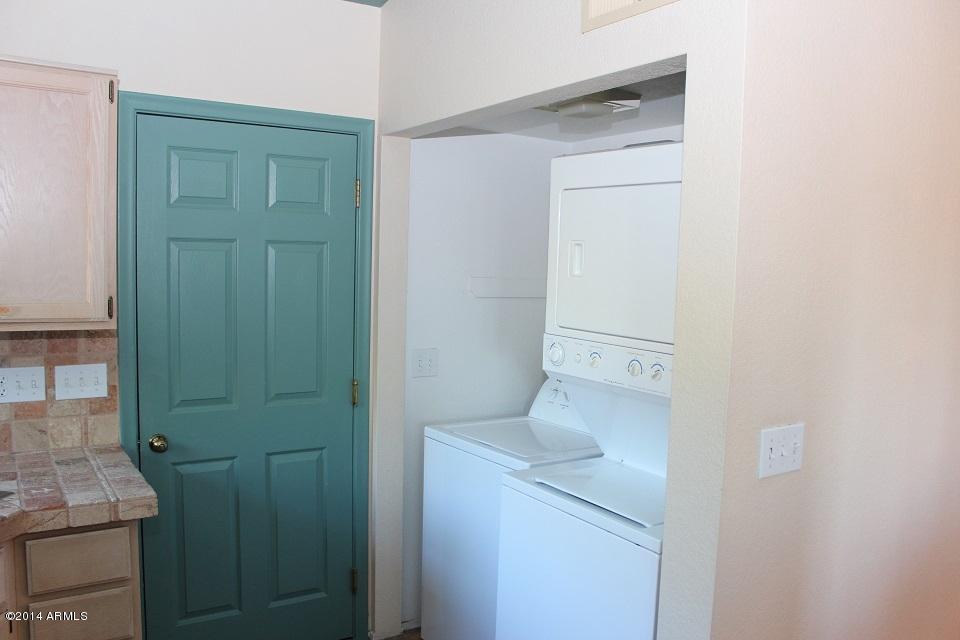 626 Nopal Court Rio Rico, AZ 85648 - Photo 15 of 27 Laundry in Kitchen 626 Nopal Ct