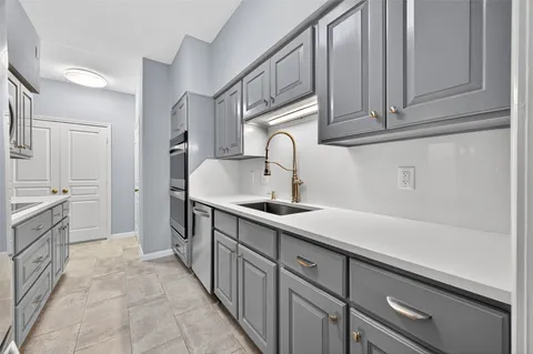a bathroom with a toilet and a sink