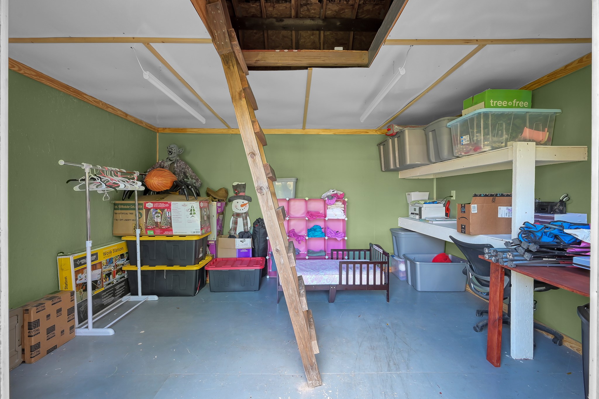 409 Mildred Street Cleveland, TX 77328 - Photo 21 of 24 a bedroom with furniture and a table