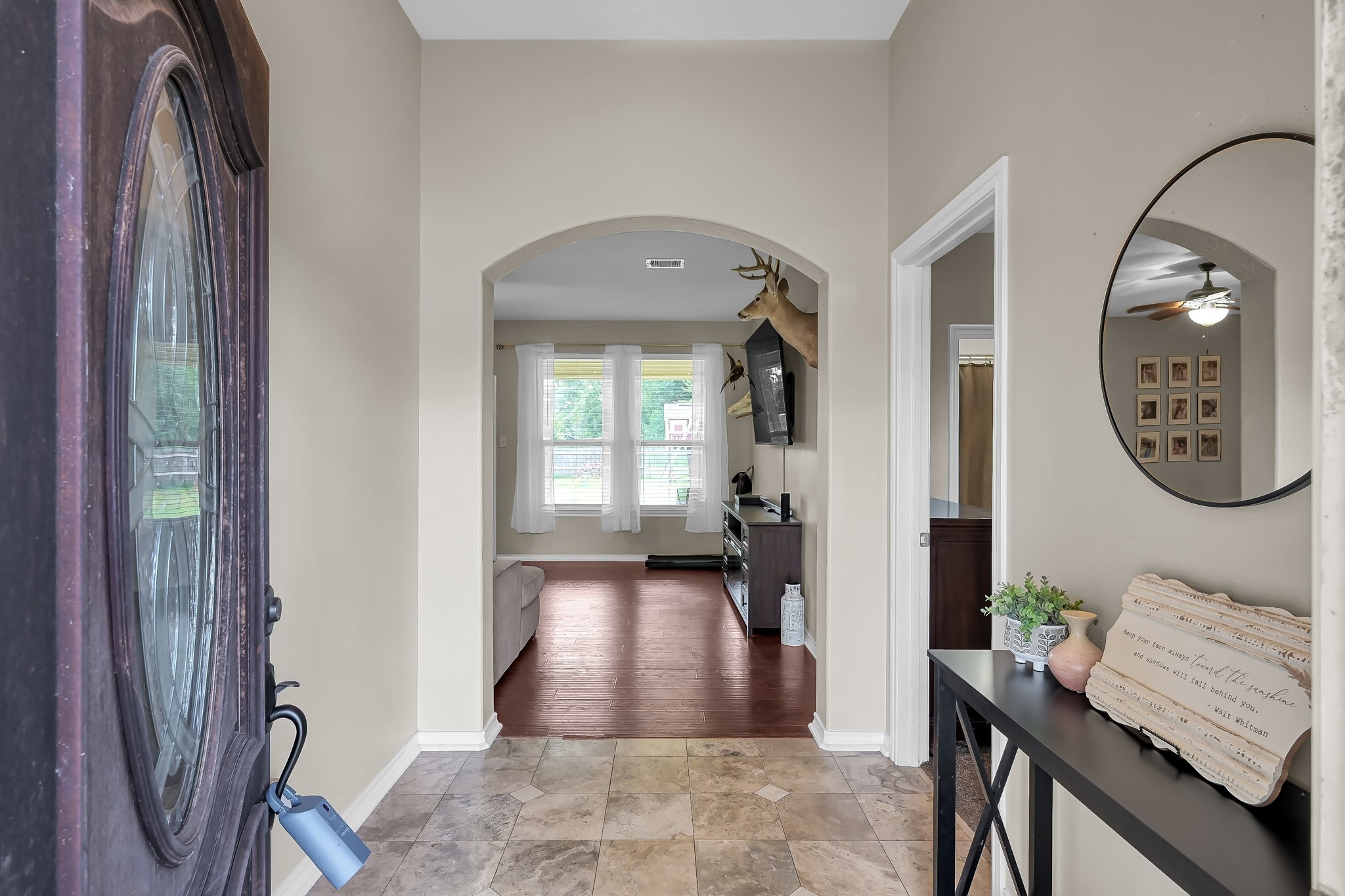 409 Mildred Street Cleveland, TX 77328 - Photo 3 of 24 a view of a hallway with elevator and mirror