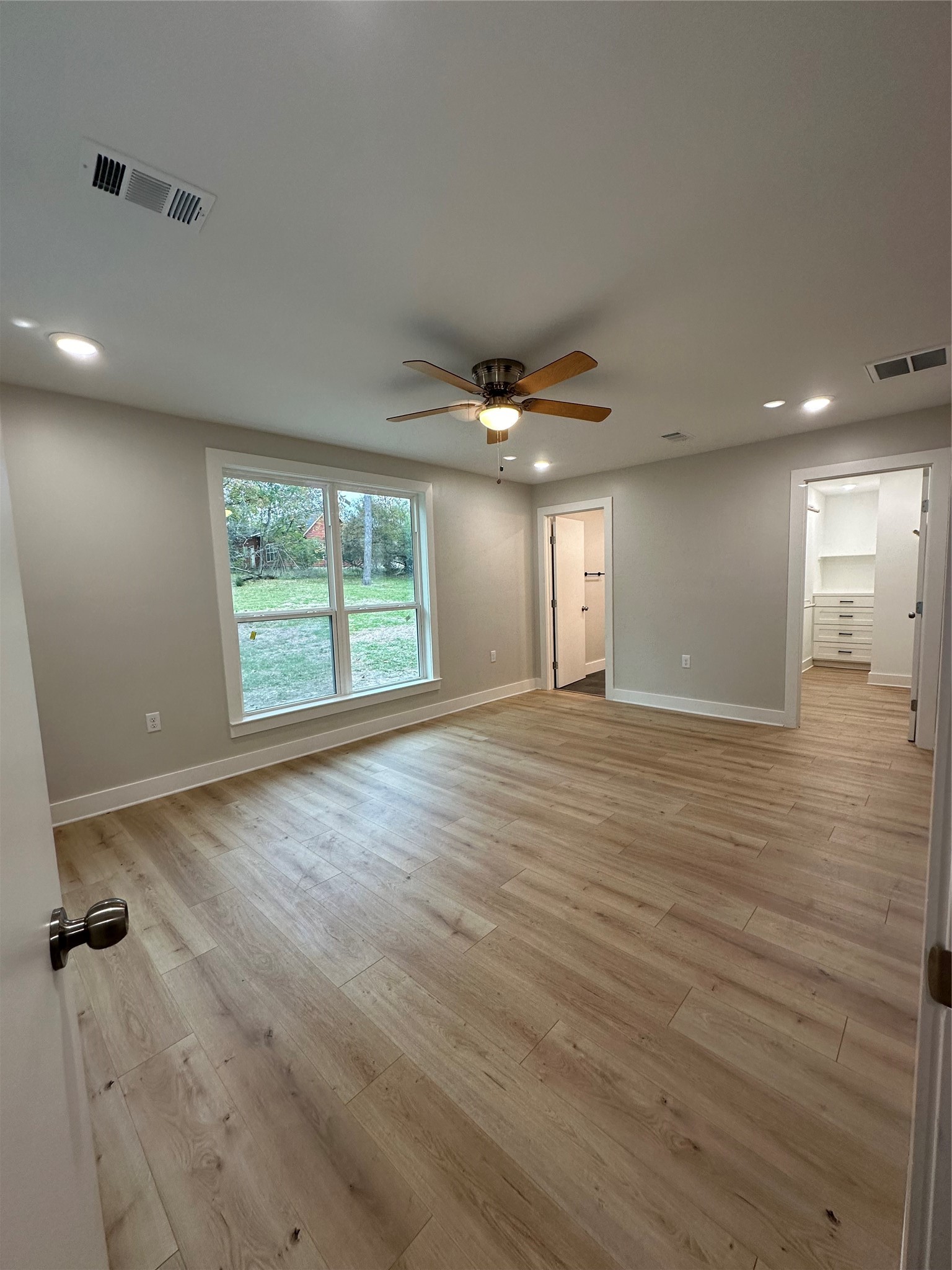 71 Castaway Lane Coldspring, TX 77331 - Photo 7 of 15 Primary Bedroom with views of the bathroom and closet