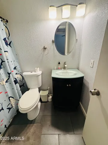 a bed room with a bed and a window