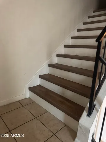 a view of a backyard with sitting area