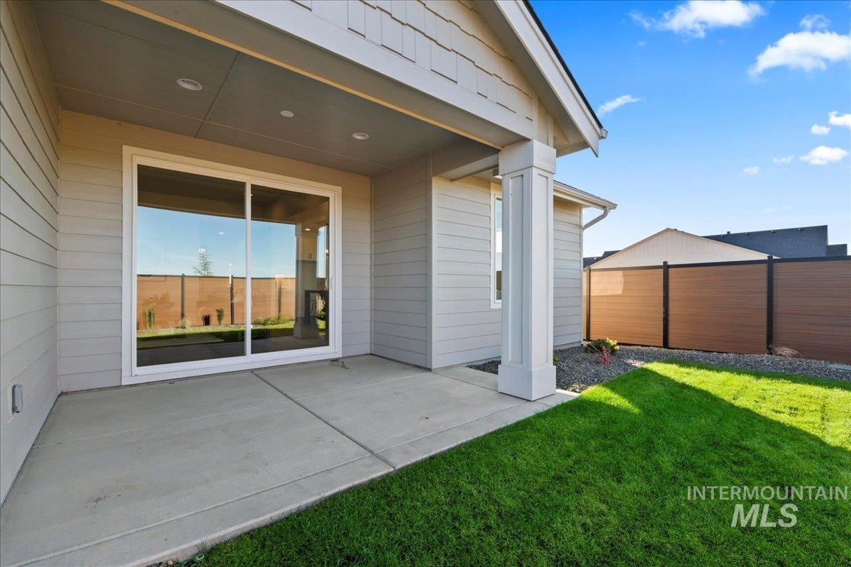 8150 West Gallup Street Meridian, ID 83646 - Photo 22 of 30 Rear view of property with a patio area
