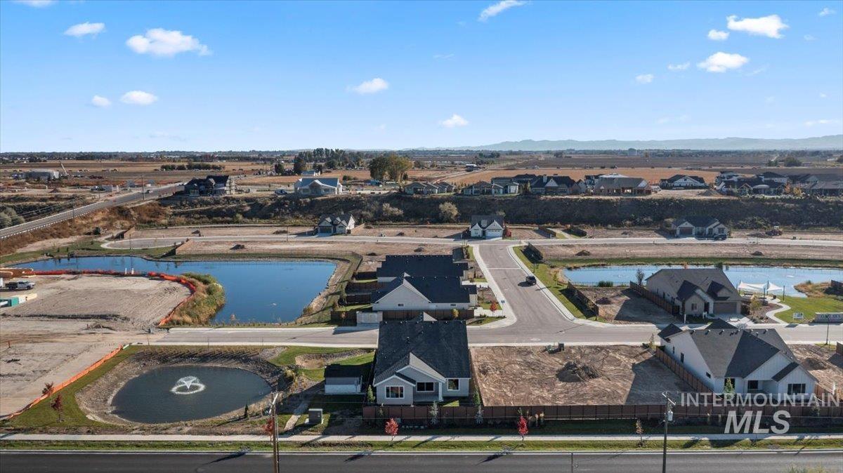 8150 West Gallup Street Meridian, ID 83646 - Photo 25 of 30 Aerial perspective of suburban area featuring a large body of water