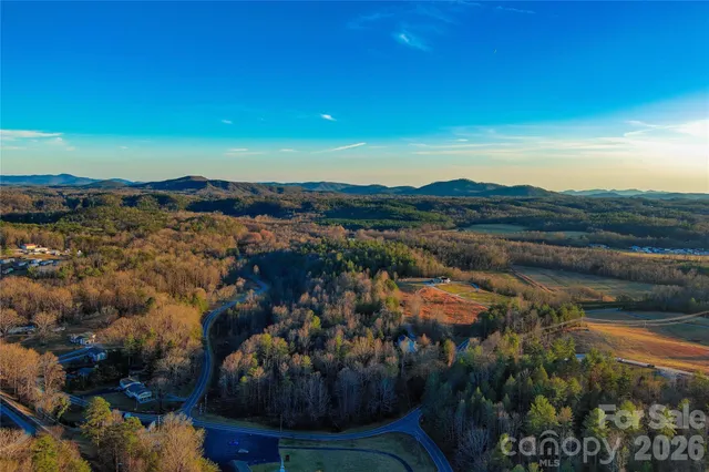 a view of a city with mountains in the background
