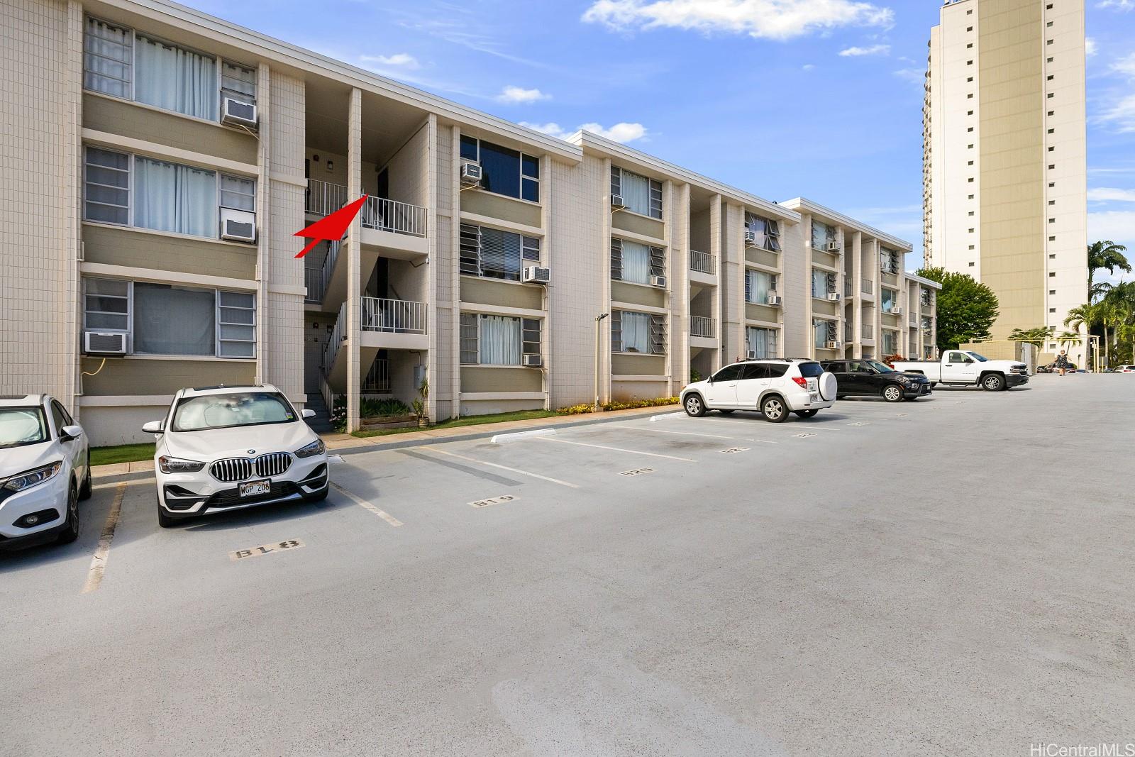 98-1030 Moanalua Road, Unit 5308 Aiea, HI 96701 - Photo 11 of 16 a car parked in front of a building