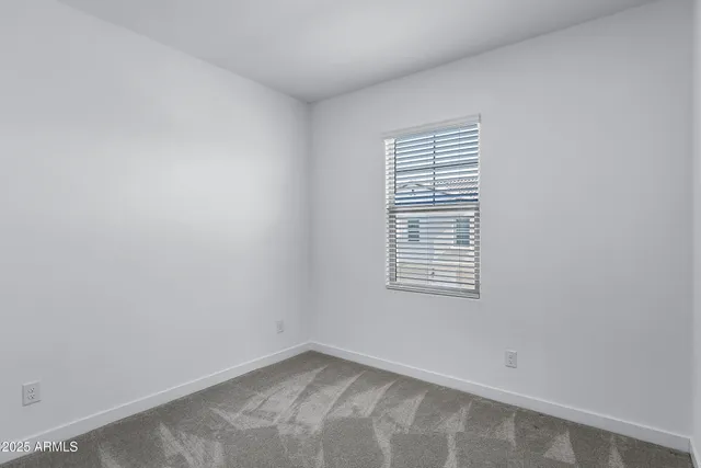 a view of entryway with washer and dryer
