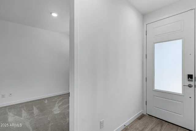 an empty room with walk in closet and closet