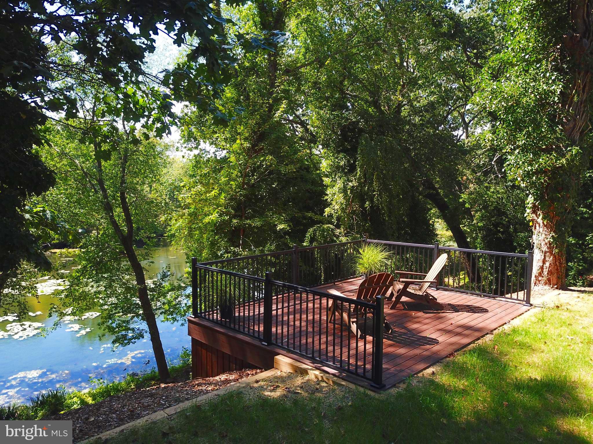 13 Meehan Boulevard Clementon, NJ 08021 - Photo 1 of 32 a view of a park with iron fence