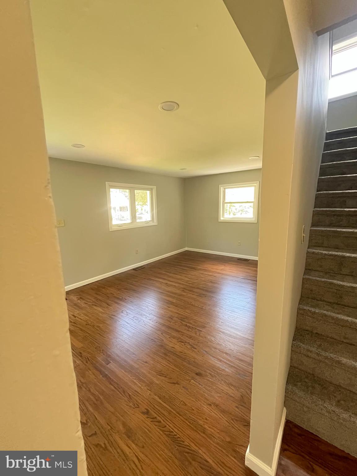 13 Meehan Boulevard Clementon, NJ 08021 - Photo 16 of 32 a view of an empty room with wooden floor and a window