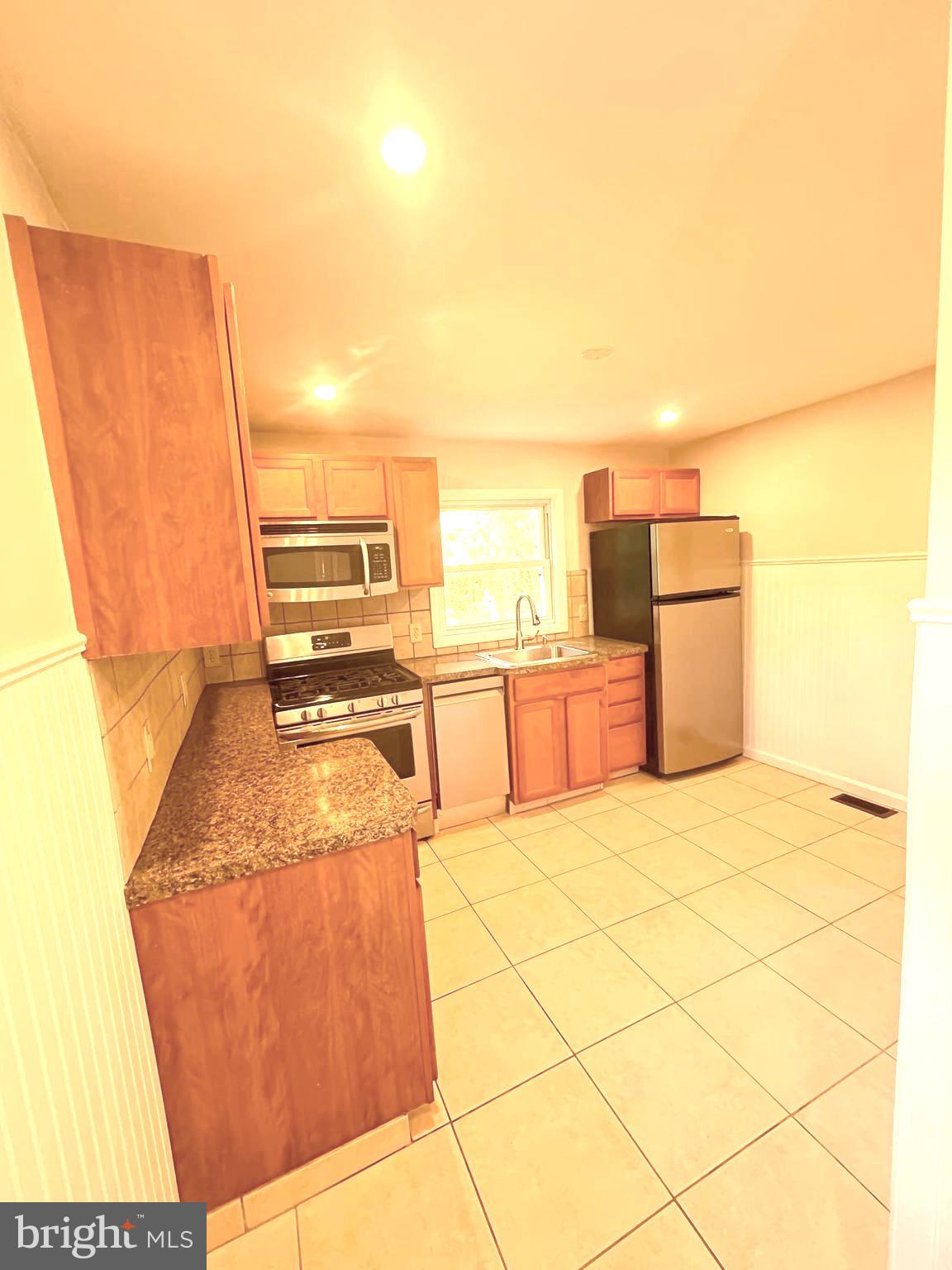 13 Meehan Boulevard Clementon, NJ 08021 - Photo 27 of 32 a kitchen with a sink cabinets and appliances