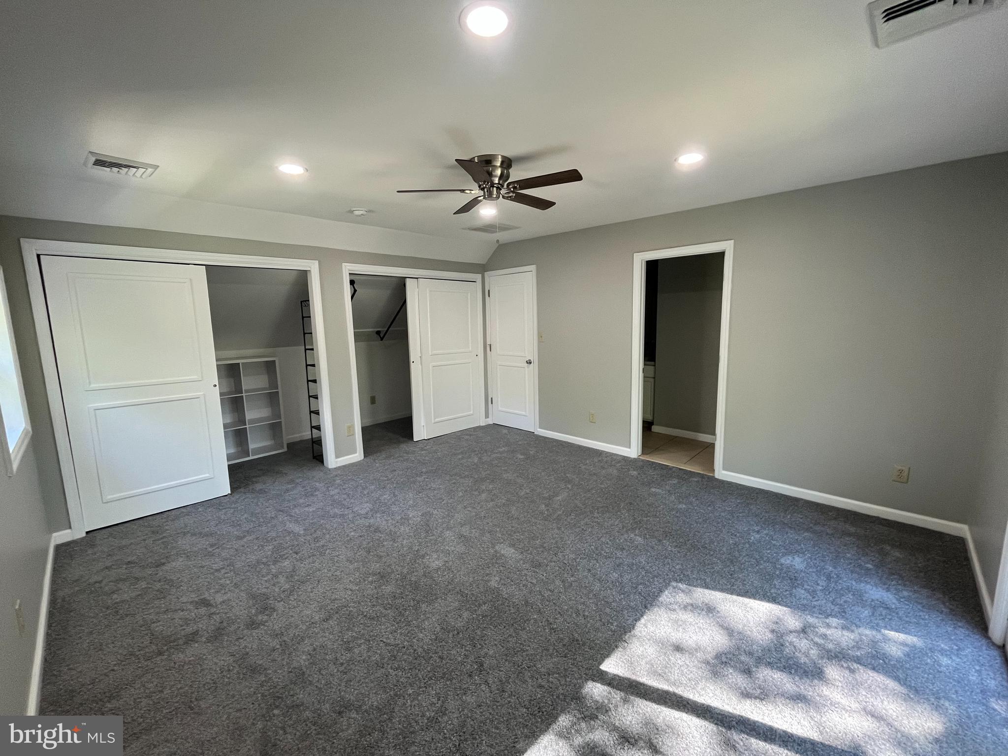 13 Meehan Boulevard Clementon, NJ 08021 - Photo 8 of 32 an empty room with closet and a ceiling fan