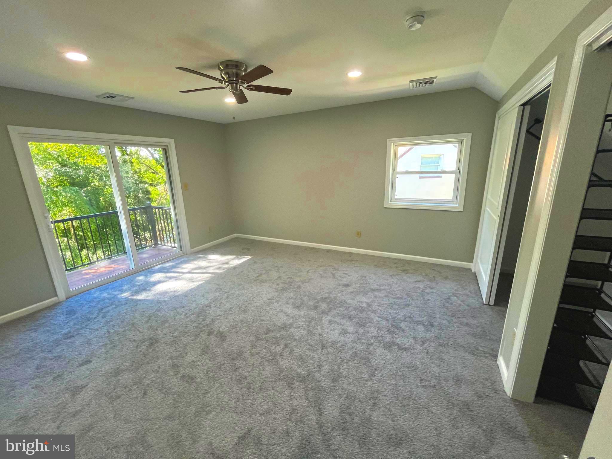 13 Meehan Boulevard Clementon, NJ 08021 - Photo 9 of 32 a view of a livingroom with a ceiling fan and window