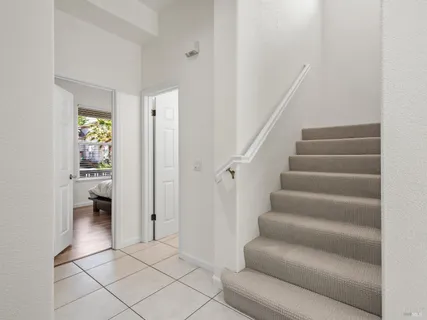 a view of an entryway with livingroom