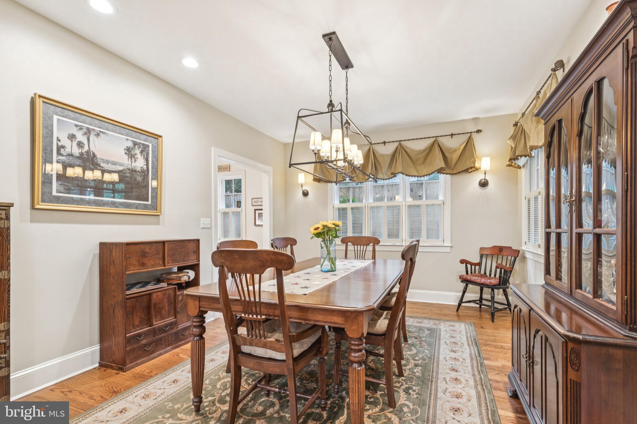 9 Tolson Street Annapolis, MD 21401 - Photo 12 of 82 a view of a dining room with furniture and wooden floor