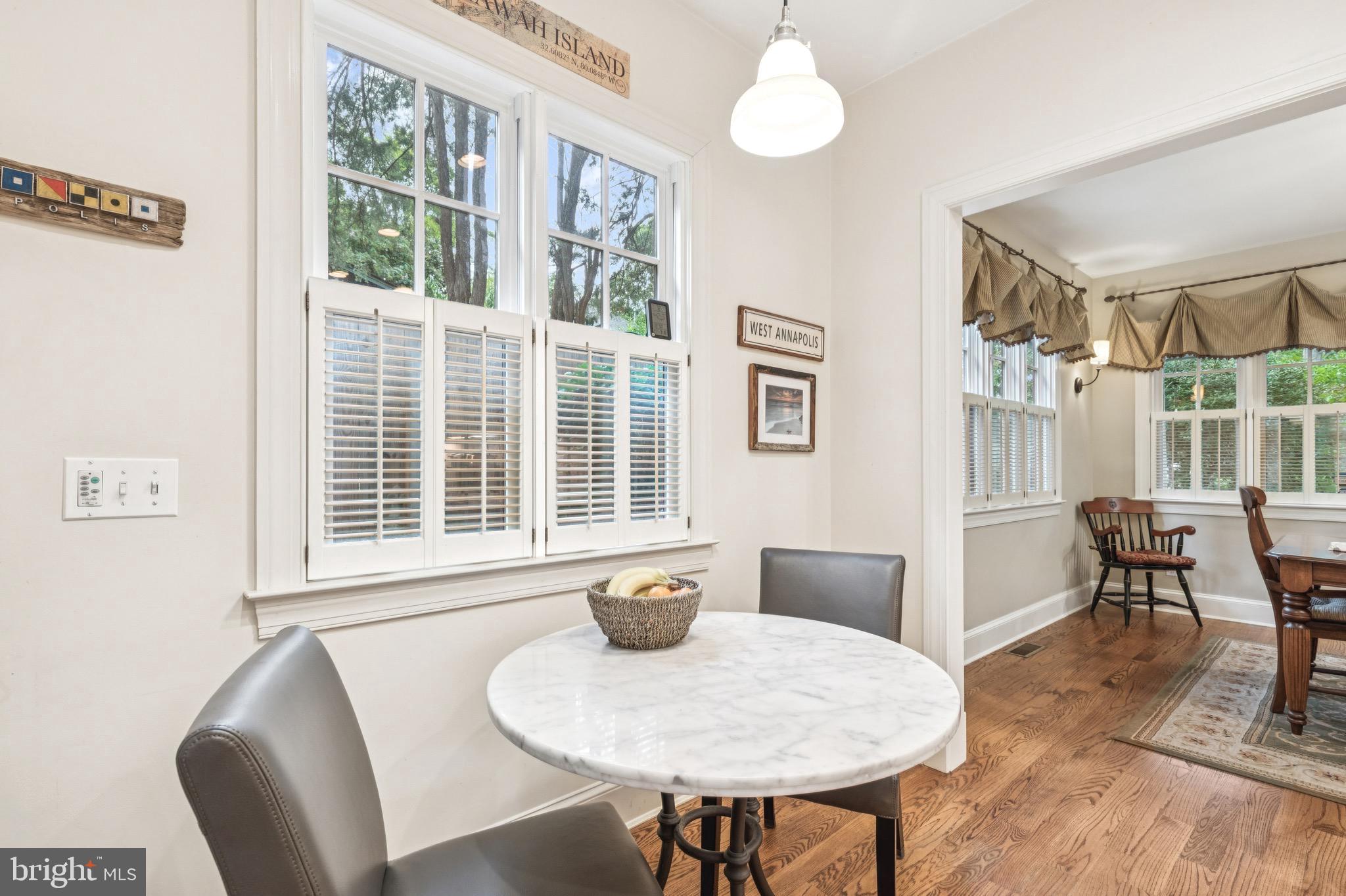 9 Tolson Street Annapolis, MD 21401 - Photo 14 of 82 a view of a dining room with furniture window and wooden floor