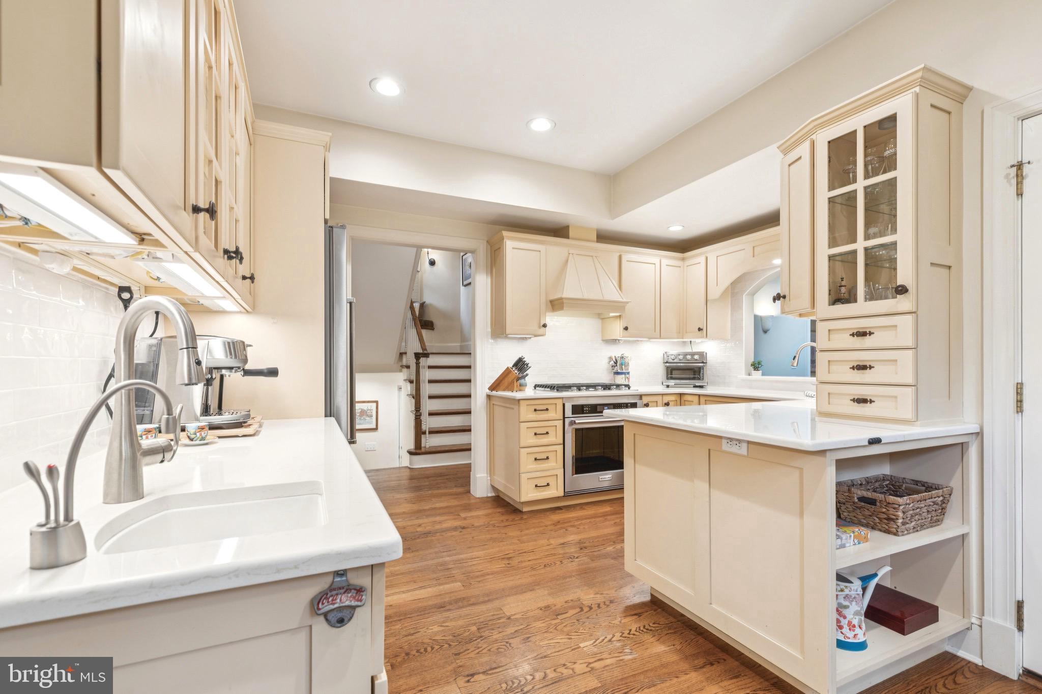 9 Tolson Street Annapolis, MD 21401 - Photo 17 of 82 a kitchen with a sink stove and refrigerator