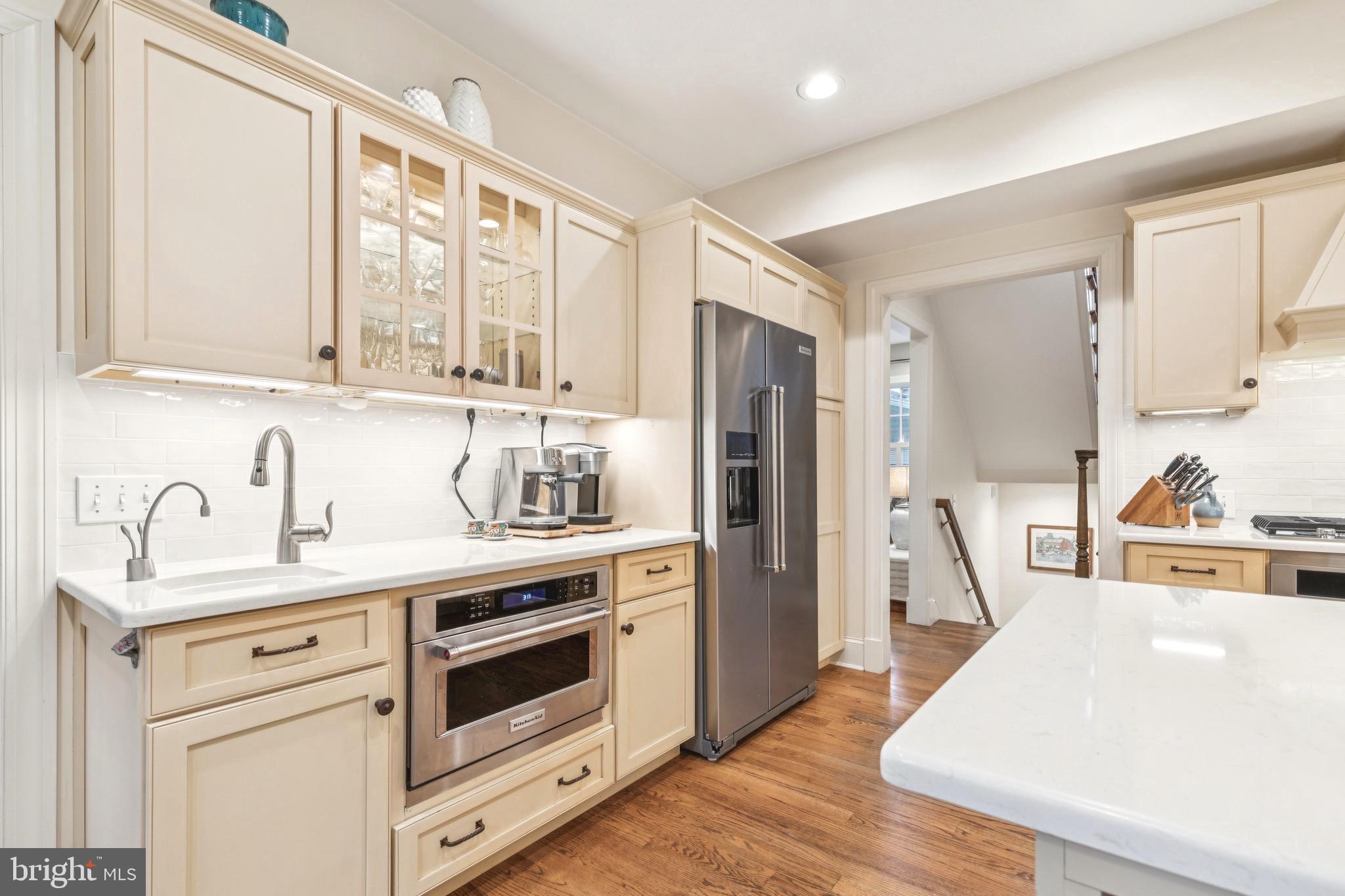 9 Tolson Street Annapolis, MD 21401 - Photo 18 of 82 a kitchen with stainless steel appliances a stove refrigerator sink and cabinets