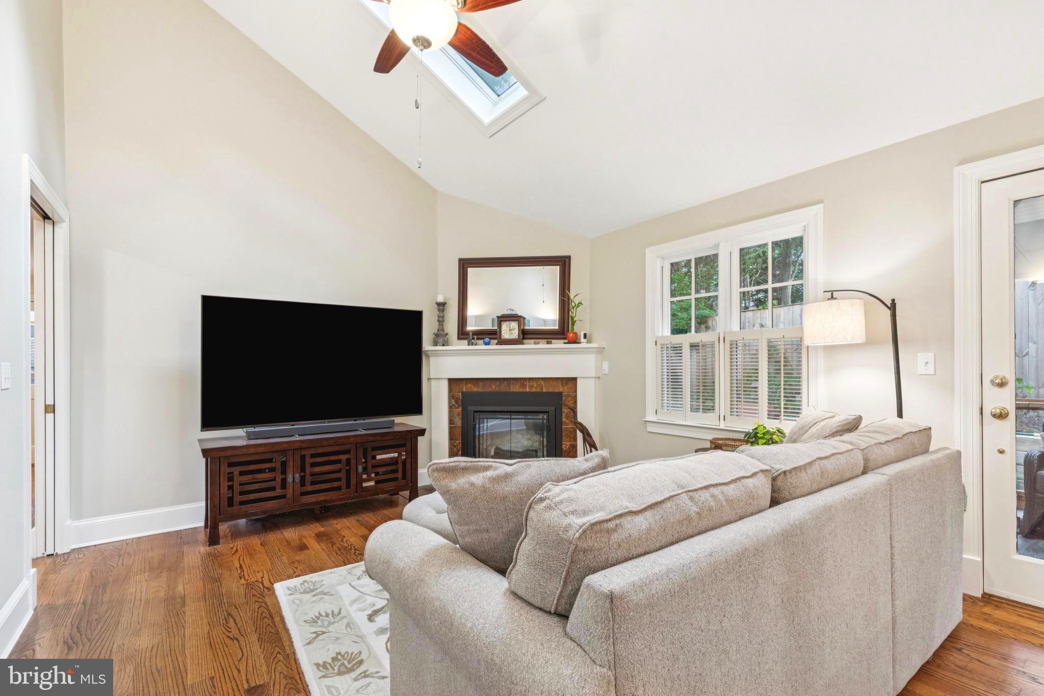 9 Tolson Street Annapolis, MD 21401 - Photo 31 of 82 a living room with furniture and a flat screen tv
