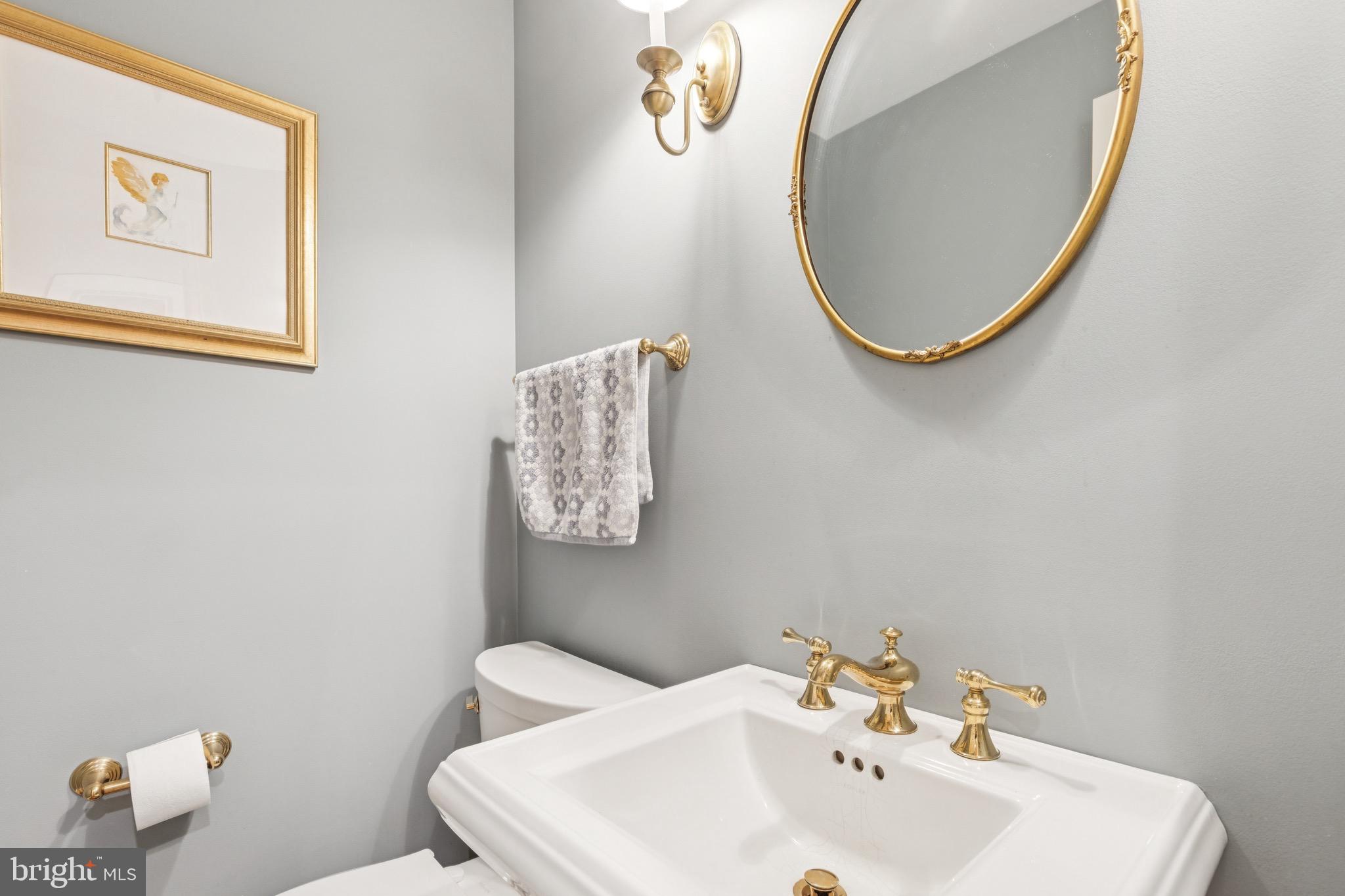 9 Tolson Street Annapolis, MD 21401 - Photo 33 of 82 a bathroom with a sink and a mirror