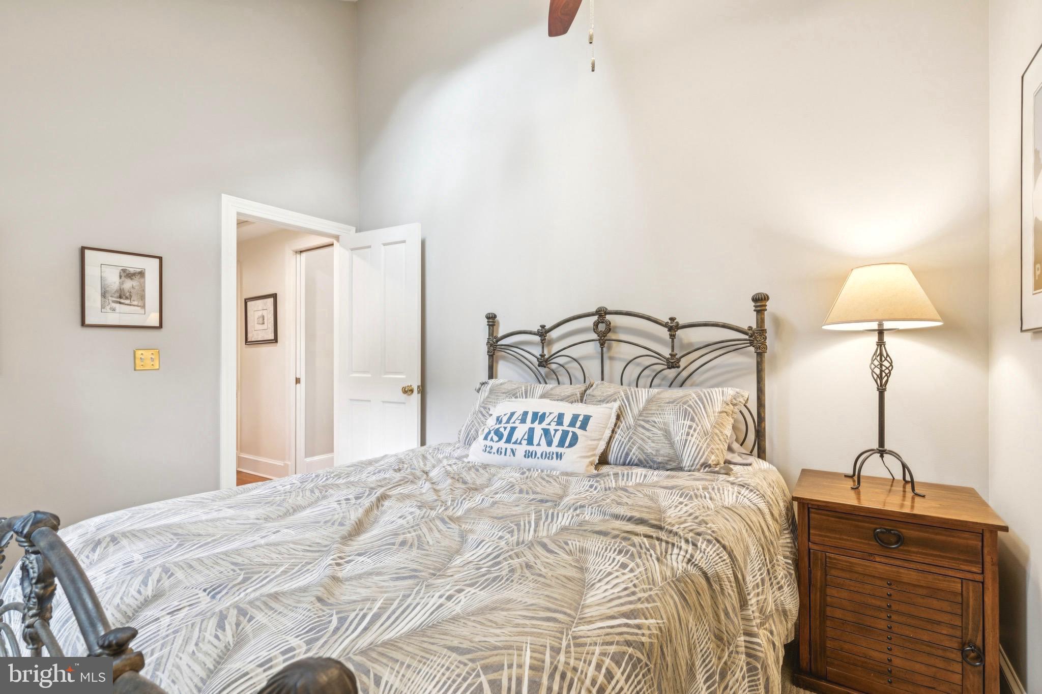 9 Tolson Street Annapolis, MD 21401 - Photo 37 of 82 a bedroom with a bed and a night stand