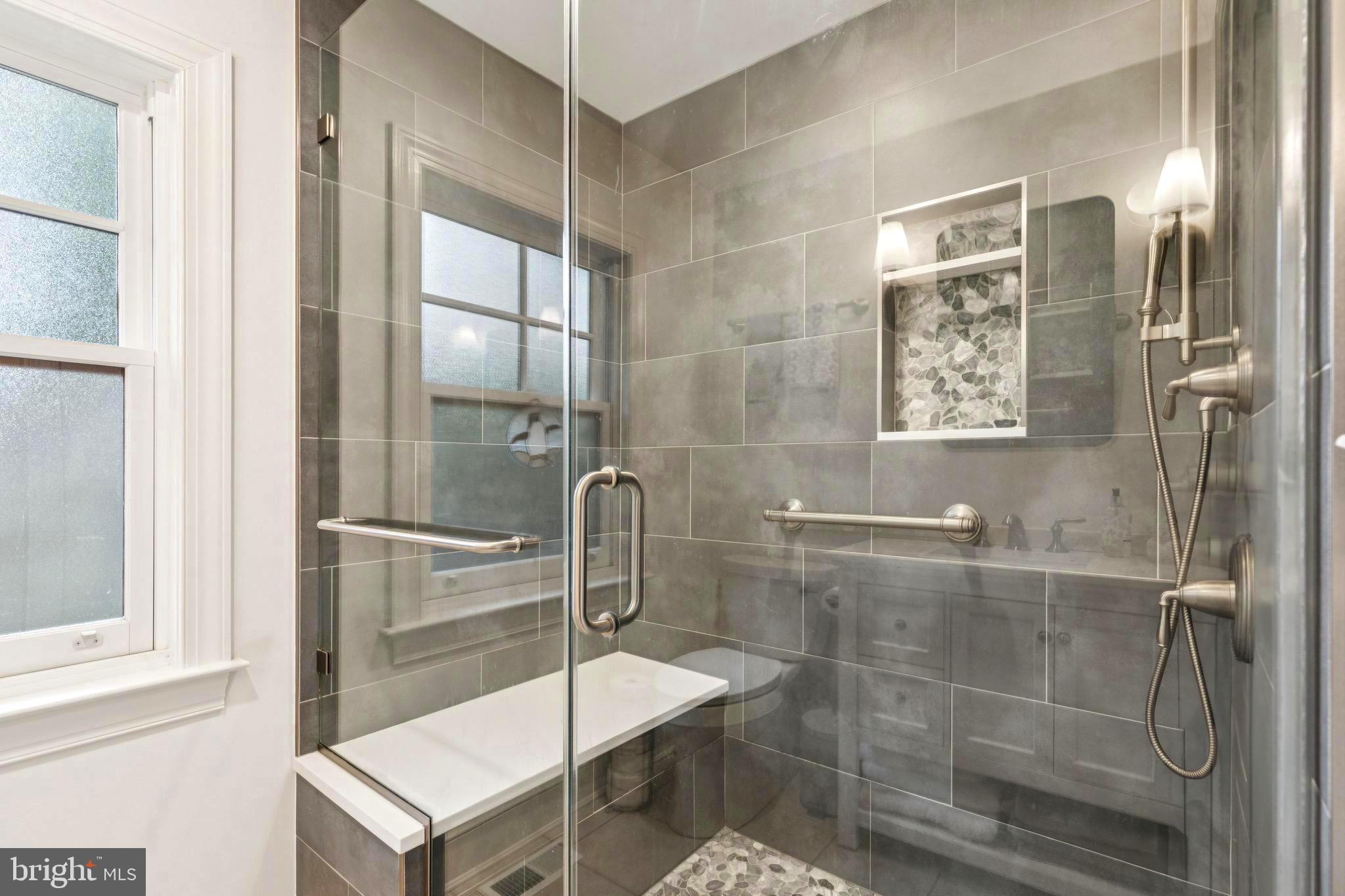 9 Tolson Street Annapolis, MD 21401 - Photo 39 of 82 a bathroom with a shower and a sink