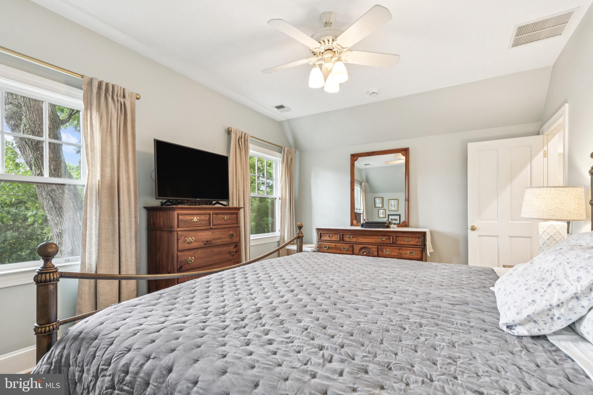 9 Tolson Street Annapolis, MD 21401 - Photo 46 of 82 a bedroom with a bed and a flat screen tv