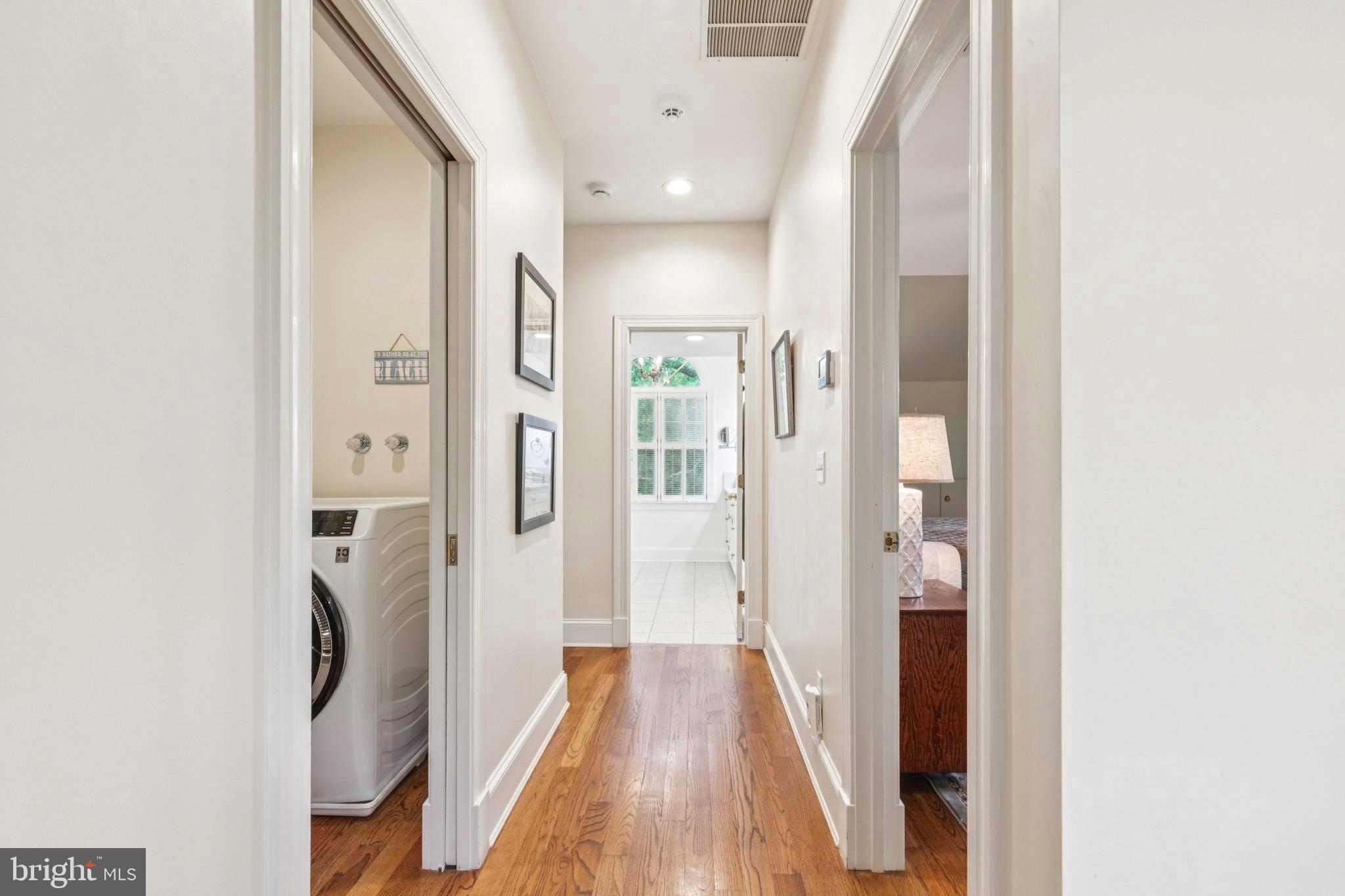9 Tolson Street Annapolis, MD 21401 - Photo 48 of 82 a view of a hallway with wooden floor and staircase