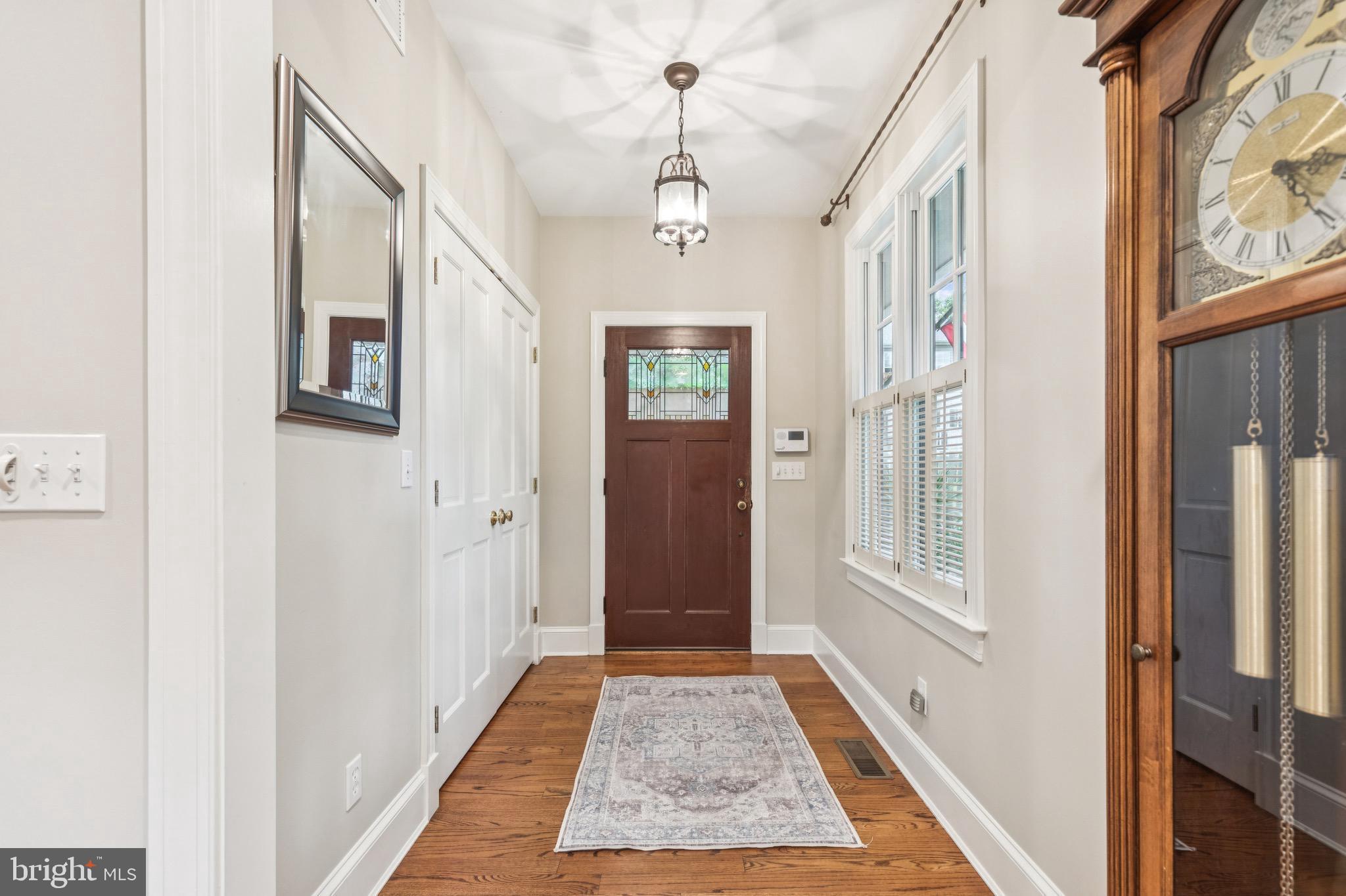 9 Tolson Street Annapolis, MD 21401 - Photo 6 of 82 a view of a hallway with wooden floor and windows