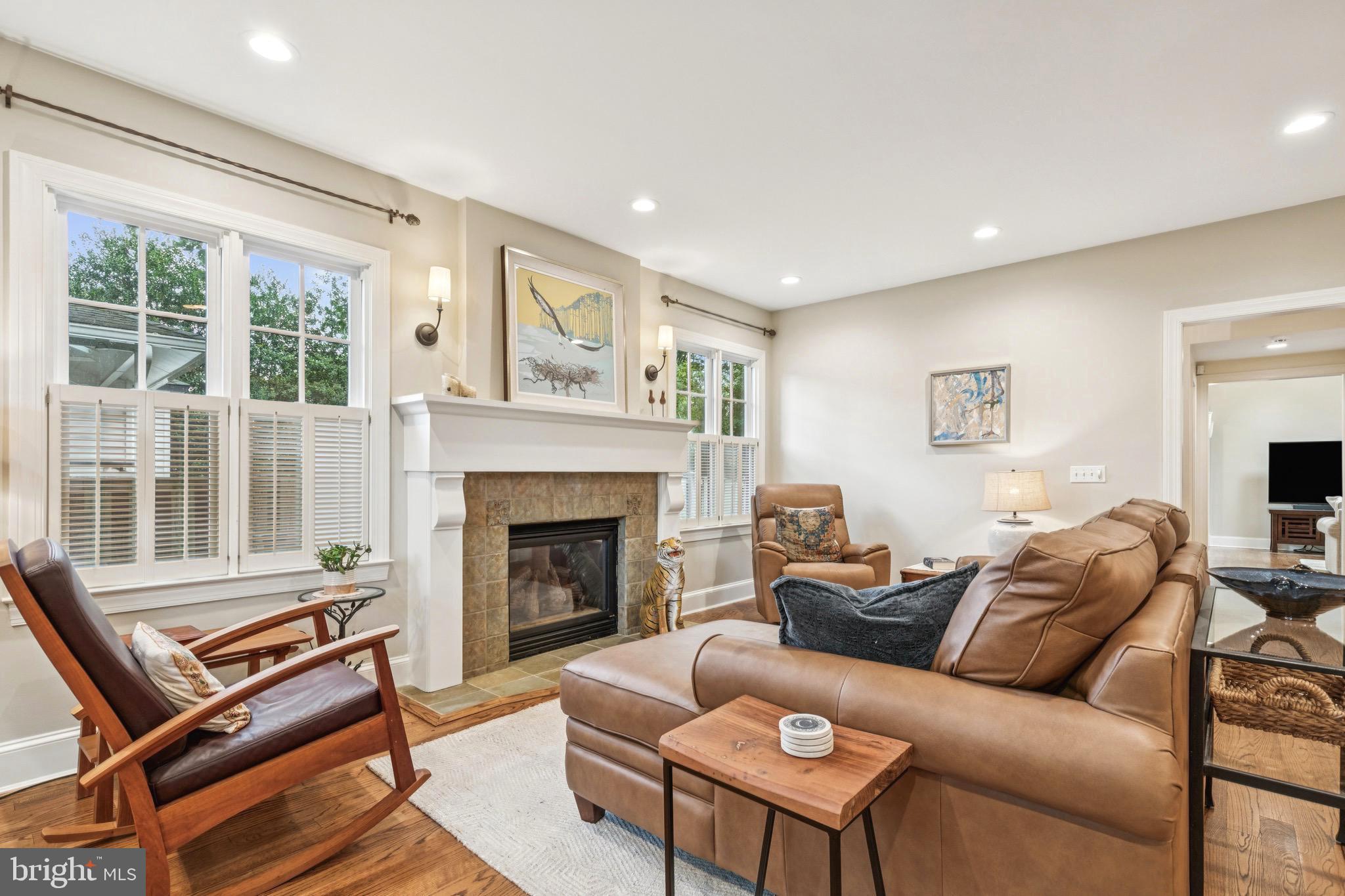 9 Tolson Street Annapolis, MD 21401 - Photo 7 of 82 a living room with furniture a flat screen tv and a fireplace